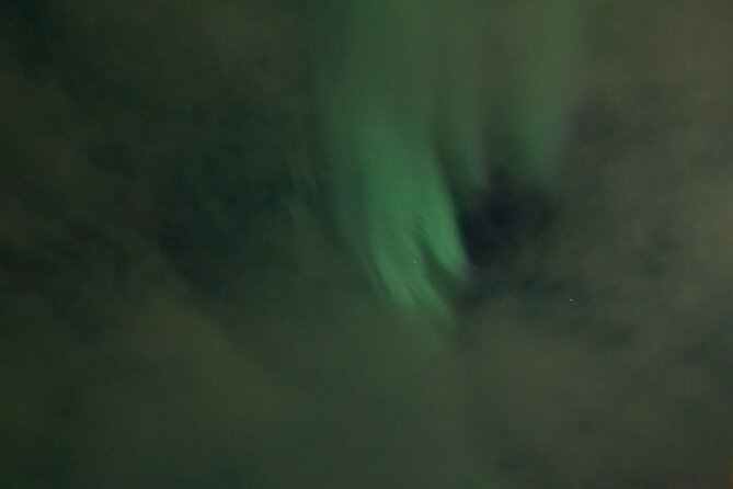 Arctic Ocean Night Floating in Ramfjord - Getting dressed for a very cold-looking idea