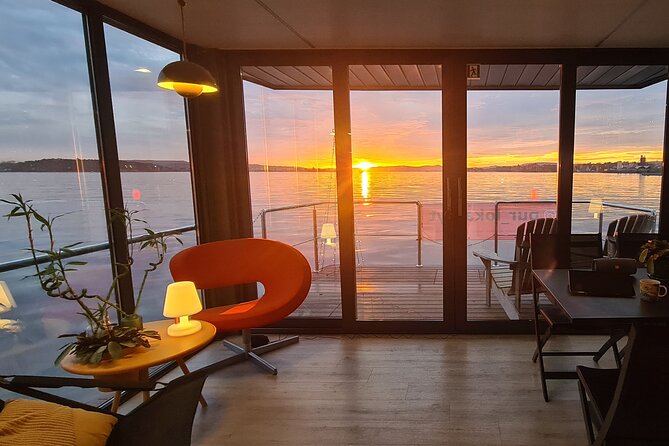 Fjord Houseboat Cruise in Oslo. 100 % electric. BYO - The marina, floating saunas, and converted barges