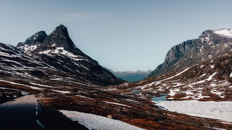 From Ålesund: Trollstigen Sightseeing Village & Fjord Tour - Sjøholt and Valldal: small places with local character