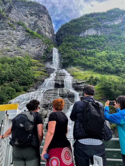 Geiranger Fjord Boat Tour with Waterfall Tasting - Meeting the white catamaran at Geiranger