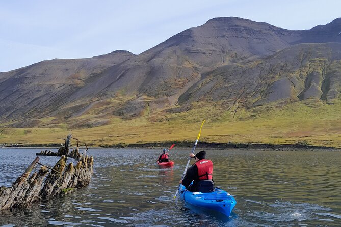 Guided kayak tour in Siglufjörður / Siglufjordur. - Getting fitted with the cold-water gear
