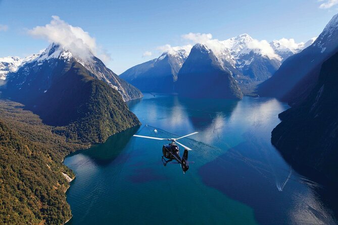 Milford and Fiordland Highlights Tour by Helicopter from Queenstown - Stepping out onto an alpine glacier
