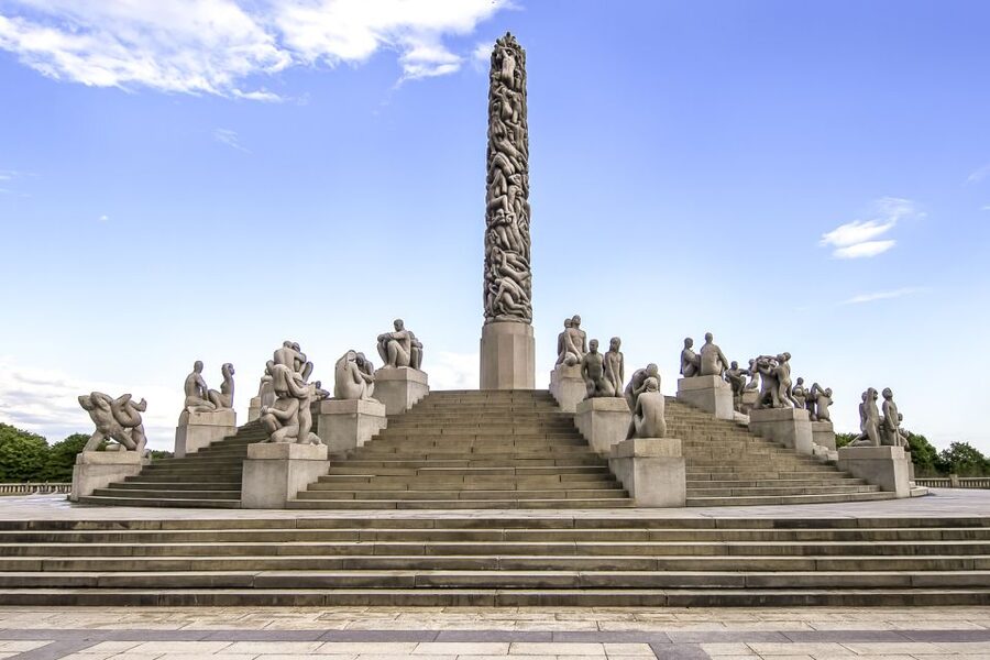 Oslo: Grand City Sightseeing Tour by Bus with Fjord Cruise - Walking through Vigeland Sculpture Park