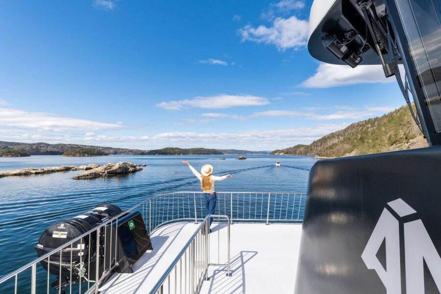 Oslo: Scenic Fjord Cruise with Audio Guide Commentary - The electric boat, indoor lounge, and open deck