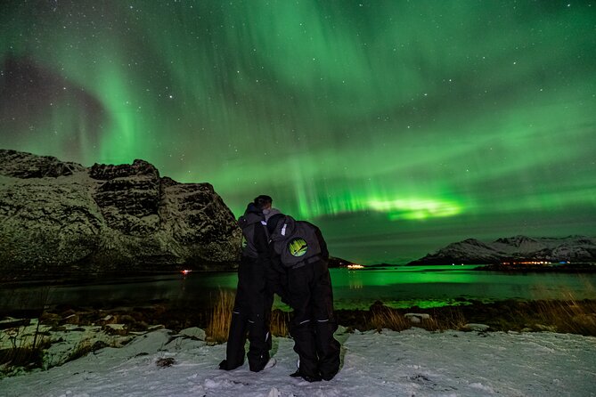 Tromsø Fjordland Aurora Chase Northern Lights by the Arctic Sea - A campfire with corn, marshmallows, and hot chocolate