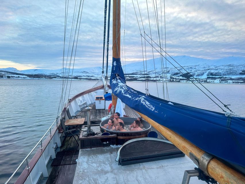 Tromsø: Luxury Polar Fjord Cruise w/ Hot Tub & Polar Plunge - Reindeer stew, hot chocolate, and a warm saloon